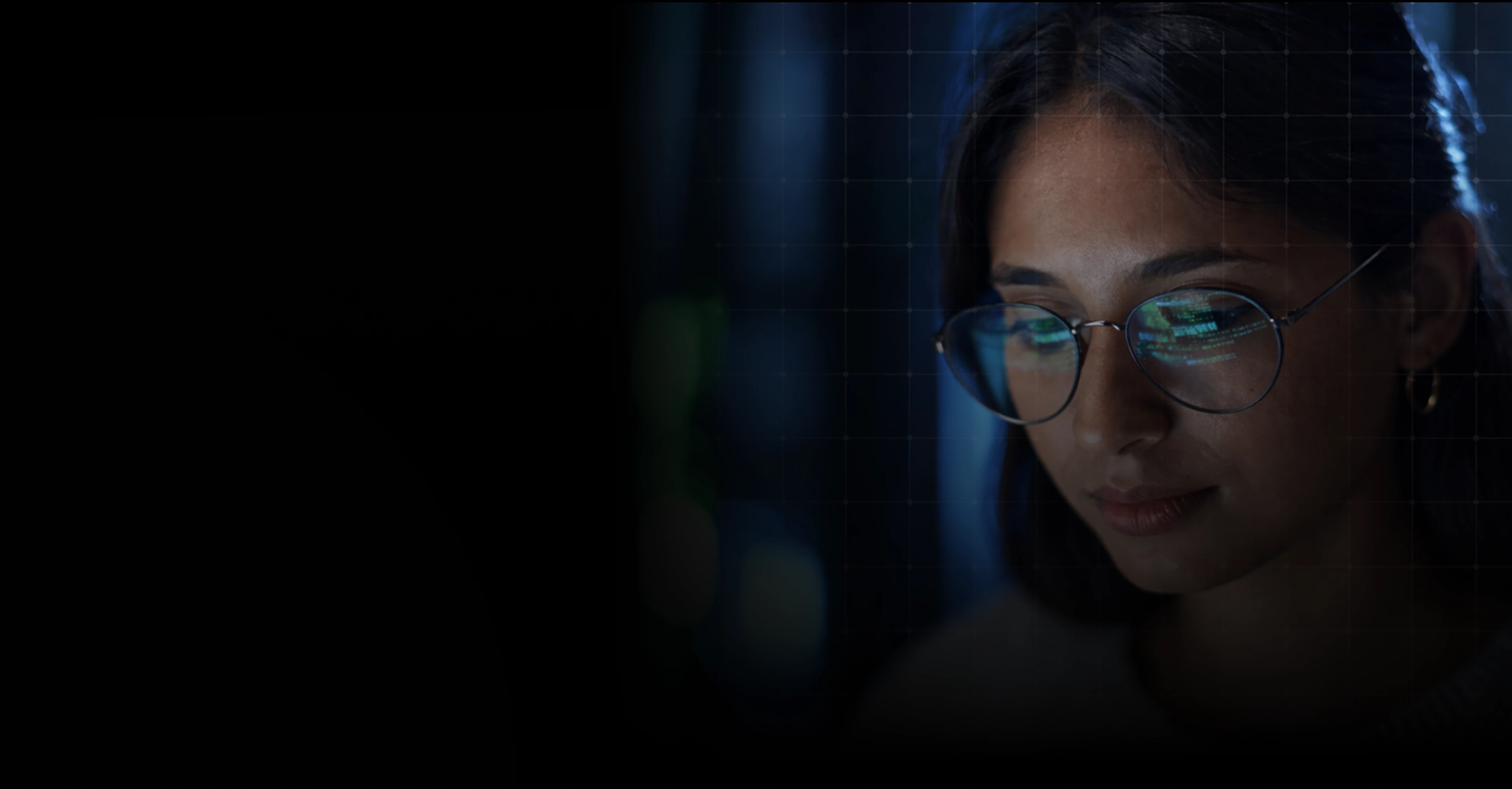 Technology professional wearing glasses reflected with digital data