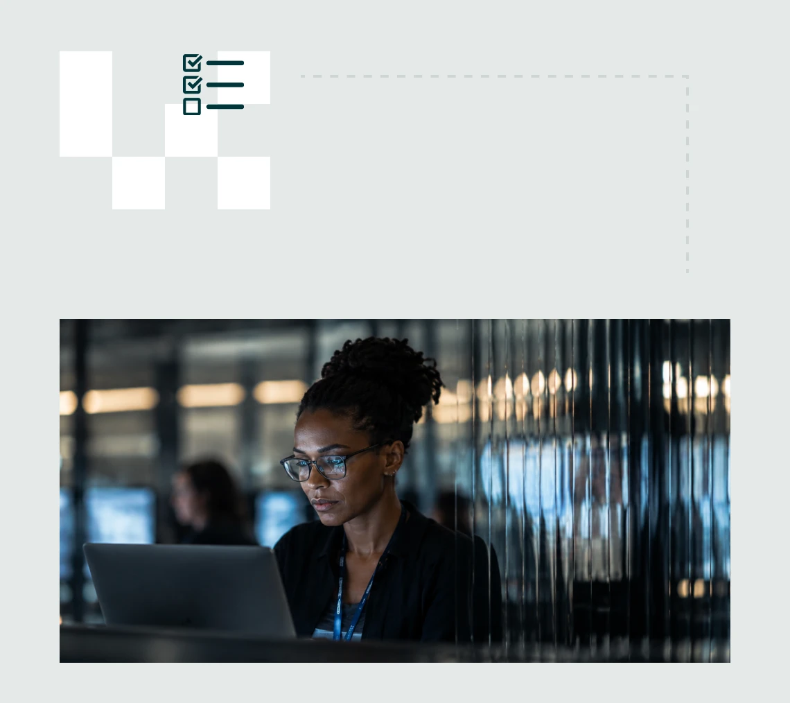 Security analyst reviewing threat intelligence at a workstation