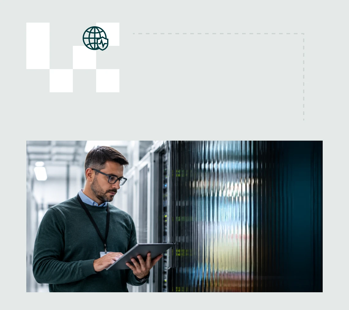 IT security professional monitoring systems in a server room